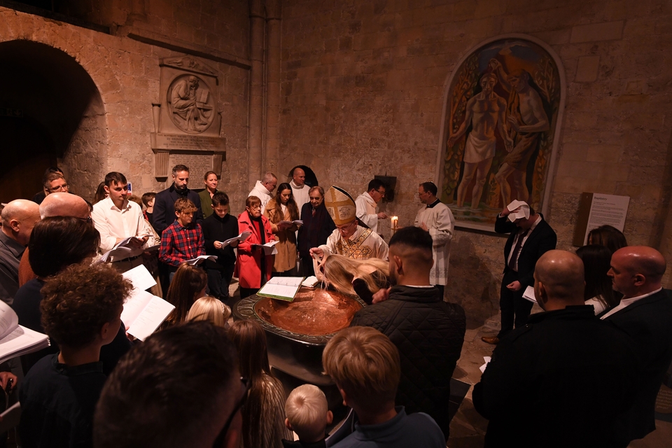 Bishop baptising